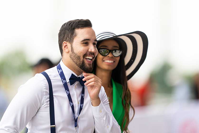 A couple enjoying at the Queen's Plate at Woodbine Racetrack