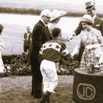 Jockey Ted Colangelo is greeted by Queen Elizabeth II