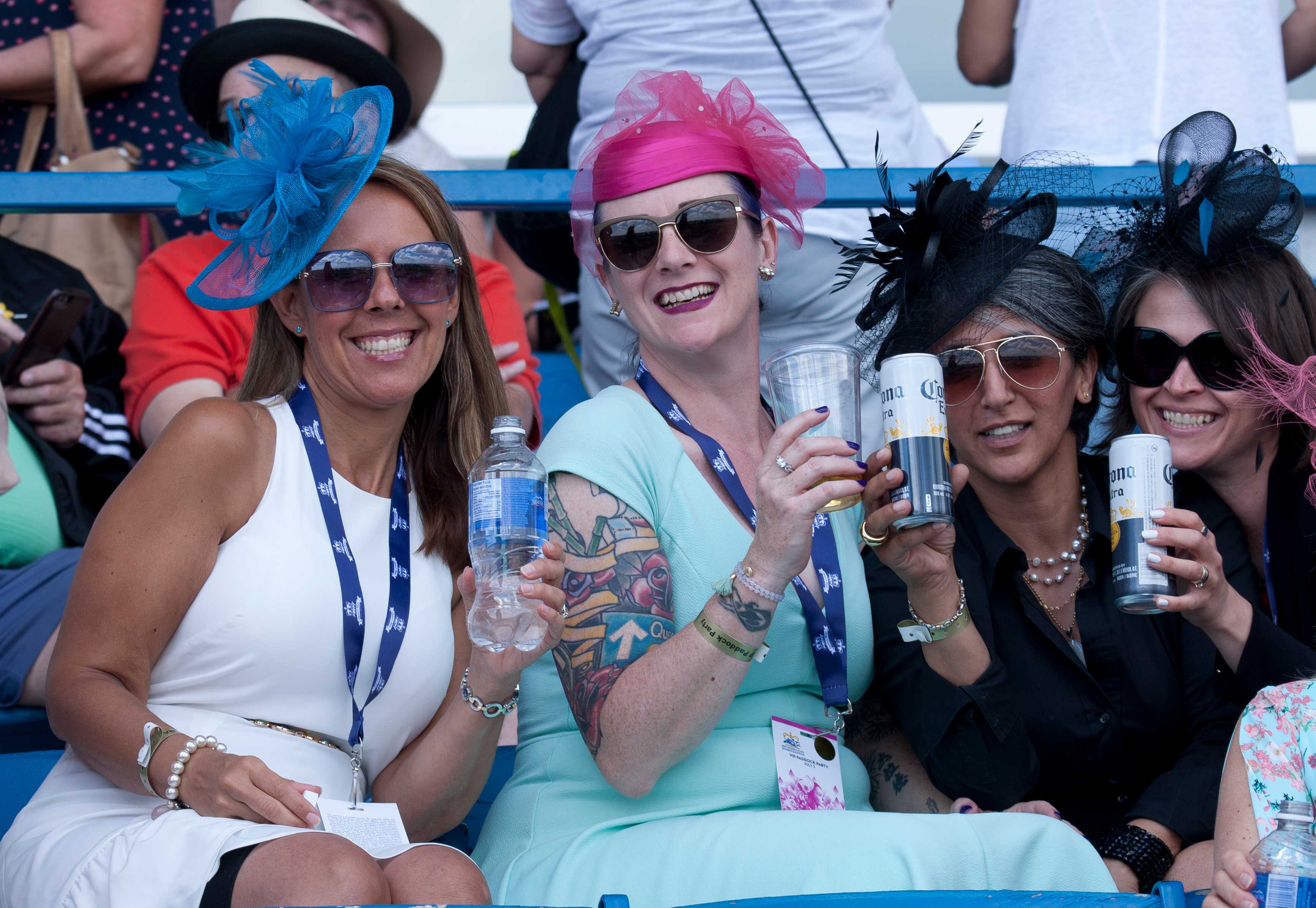 King's Plate Grandstand Tickets holders enjoying the races at Woodbine Racetrack.
