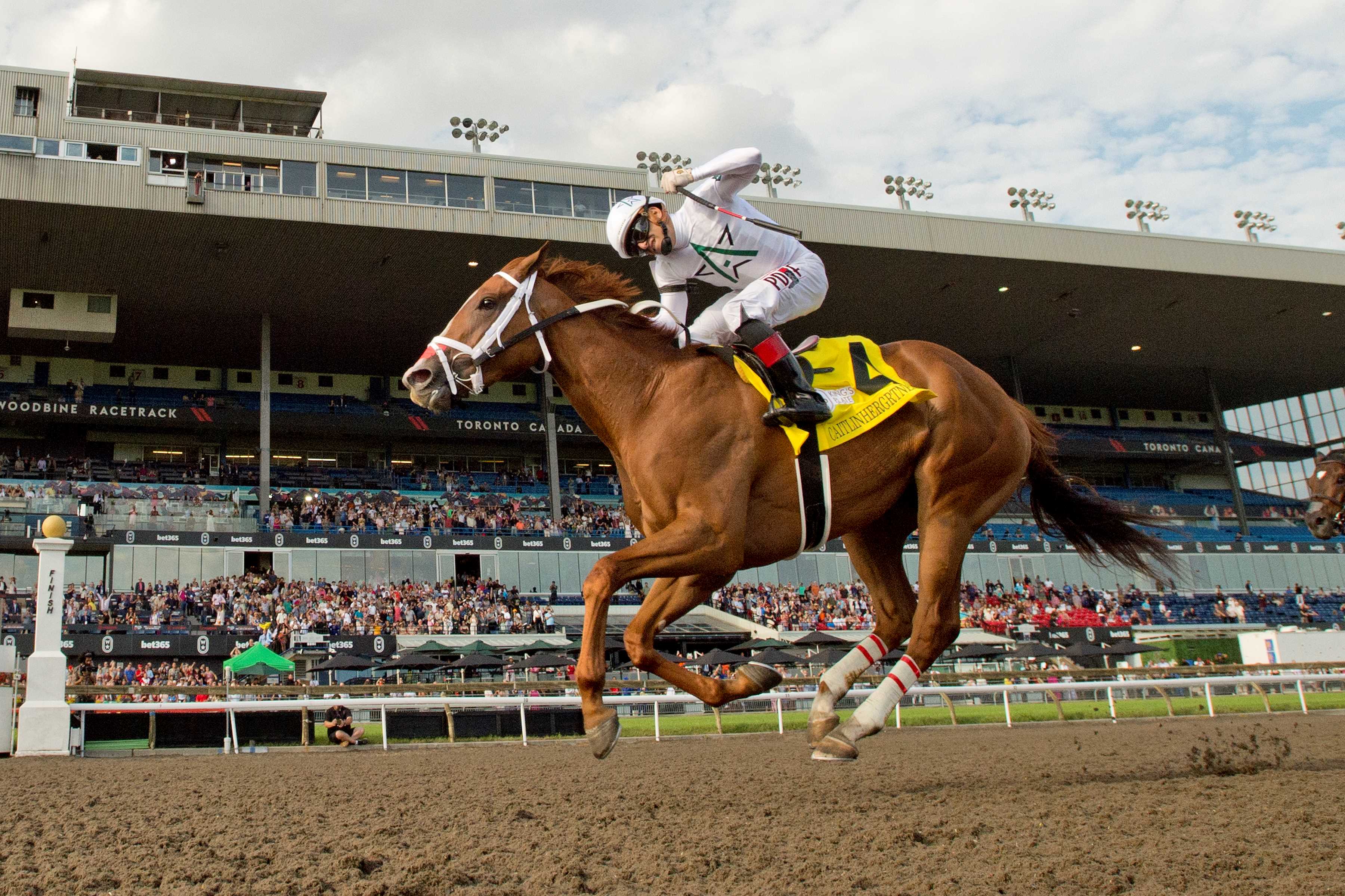 Caitlinhergrtness and jockey Rafael Hernandez winning the 165th King's Plate on August 23, 2024 at Woodbine (Michael Burns Photo)