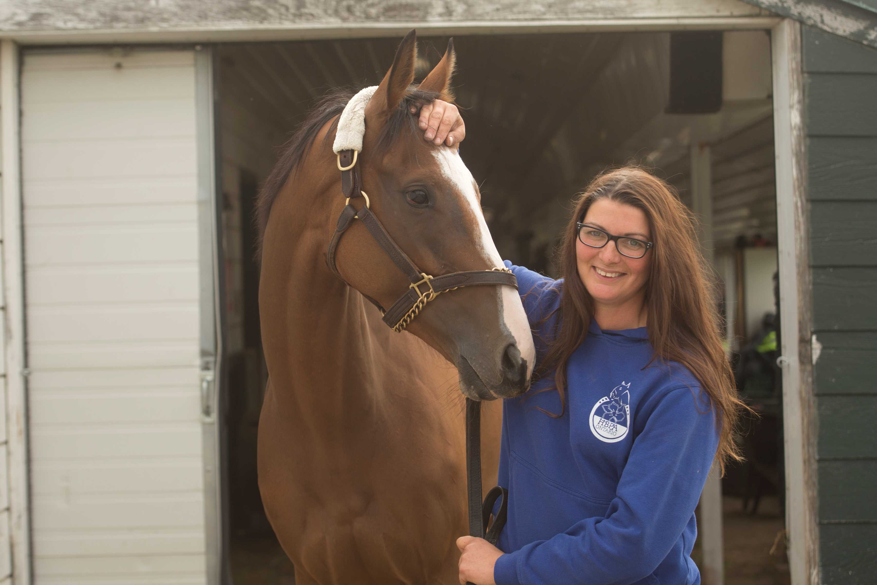 Thor's Cause and trainer Krista Cole on the Woodbine backstretch (Michael Burns Photo)