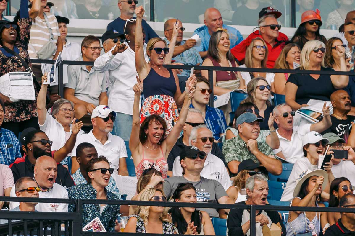 Cheering the winning horse at King's Plate from the Grandstand