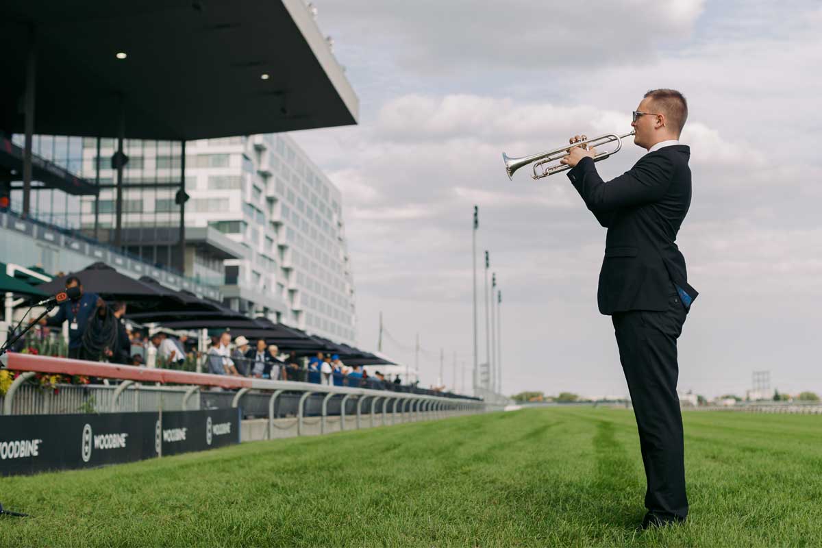 Bugle announcing the arrival of the King's Plate's chief guest at Woodbine Racetrack.