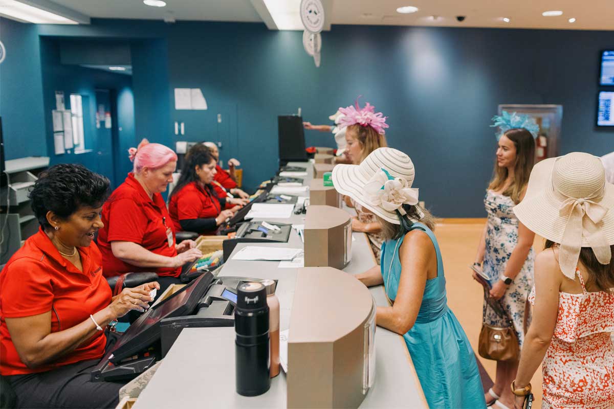 Guests at the customer services desk during King's Plate