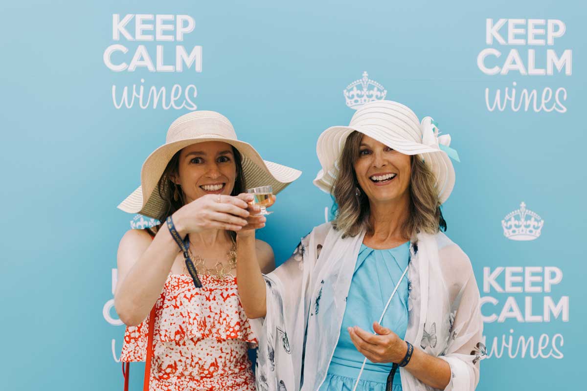 Enjoying wine at the Keep Calm Wines section during King's Plate at Woodbine Racetrack