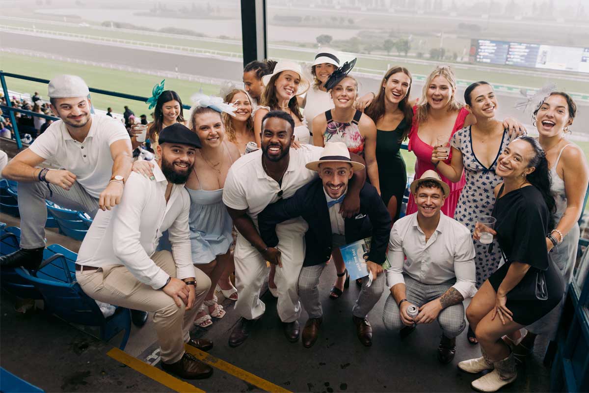 A group photo at the Grandstand during King's Plate at Woodbine Racetrack.