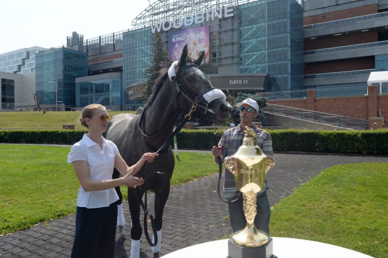 Luster and grooms with the King's Plate trophy at the Post Position Draw and Media Event on August 11, 2026 (Michael Burns Photo)
