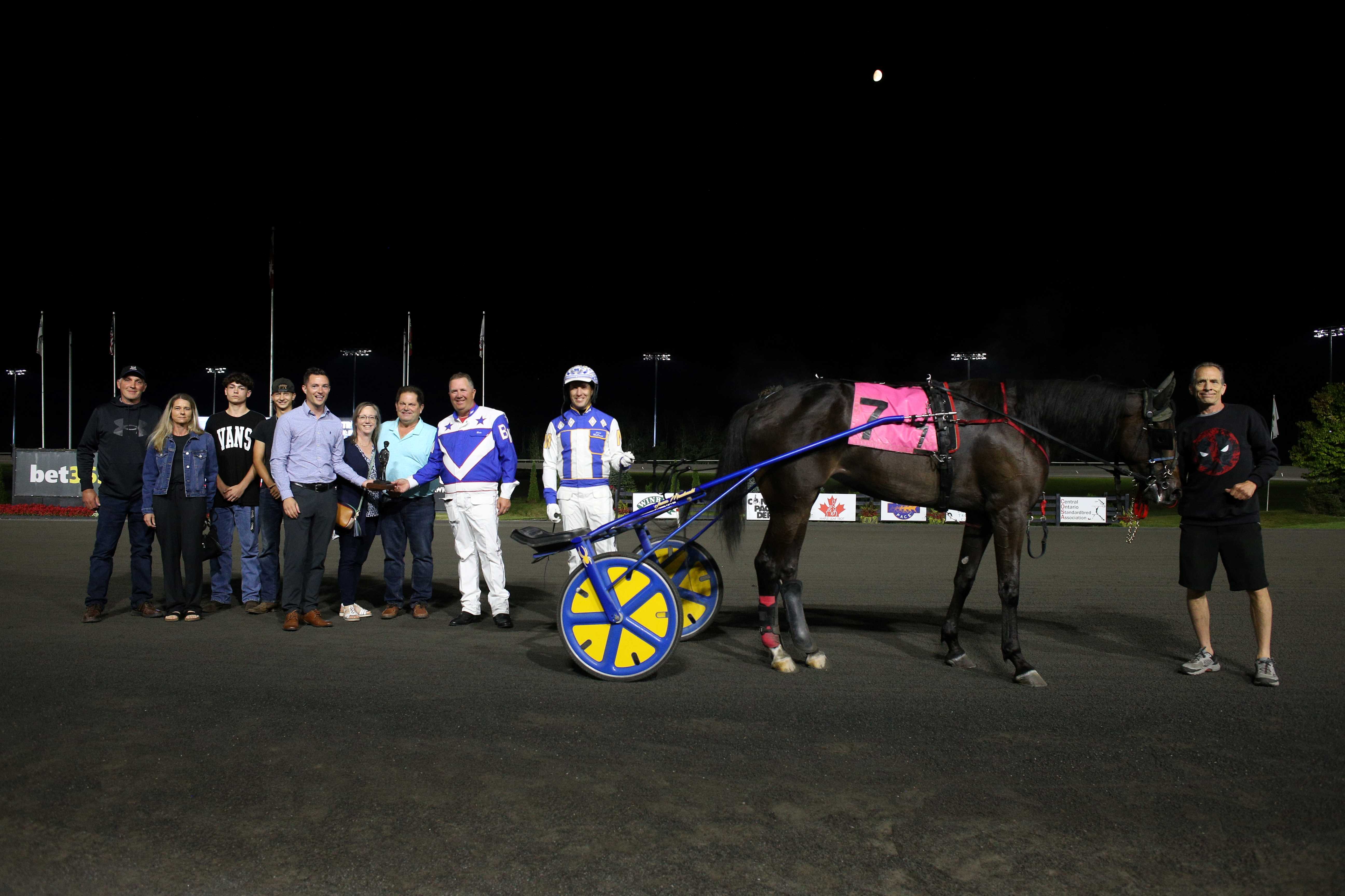 Monalishi and connections in the winner's circle for the Champlain Stakes at Woodbine Mohawk Park on September 13, 2024 at Woodbine Mohawk Park (New image Media)