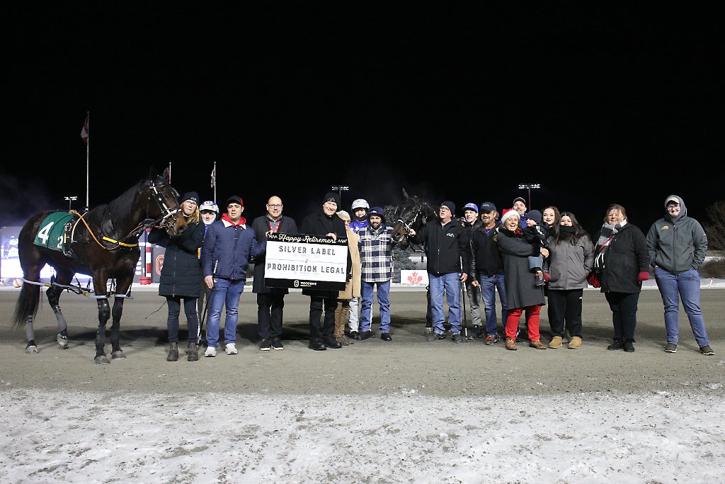 Prohibition Legal and Silver Label received a winner's circle ceremony after finishing their racing careers on Saturday night