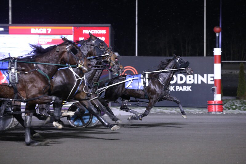 KJ Owen and driver Travis Henry winning Race 7 on December 22, 2025 at Woodbine Mohawk Park (New Image Media)