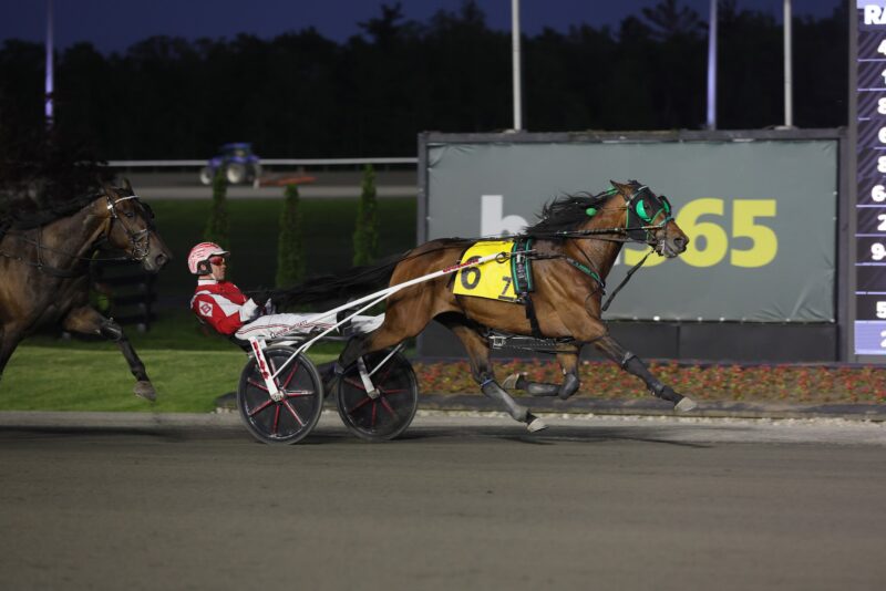 Monserrate and driver Jason Bartlett winning the Graduate Series opening leg. (New Image Media)