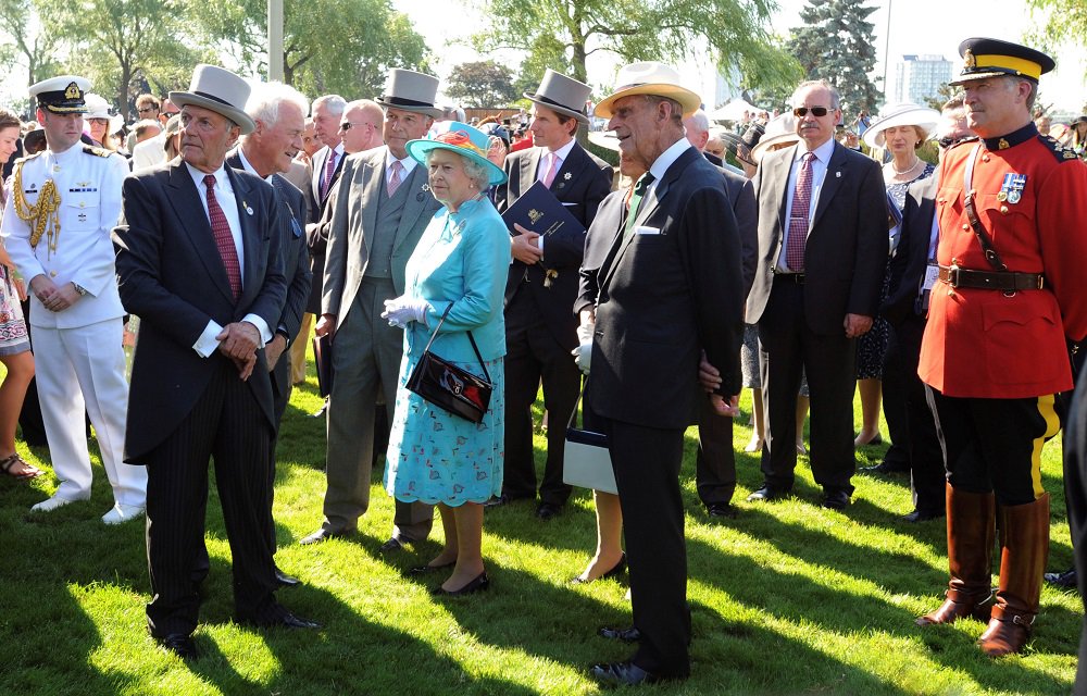 Prince Philip and Queen Elizabeth II at Woodbine Racetrack meeting with guests