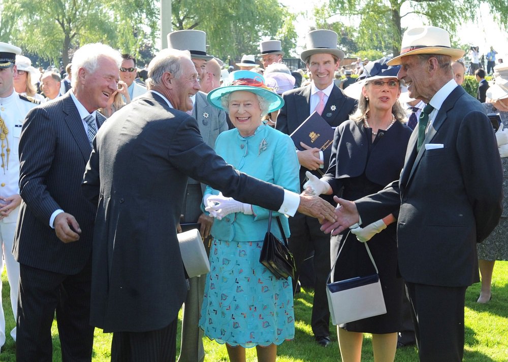 Prince Philip with Queen Elizabeth II at Woodbine Racetrack meeting with guests