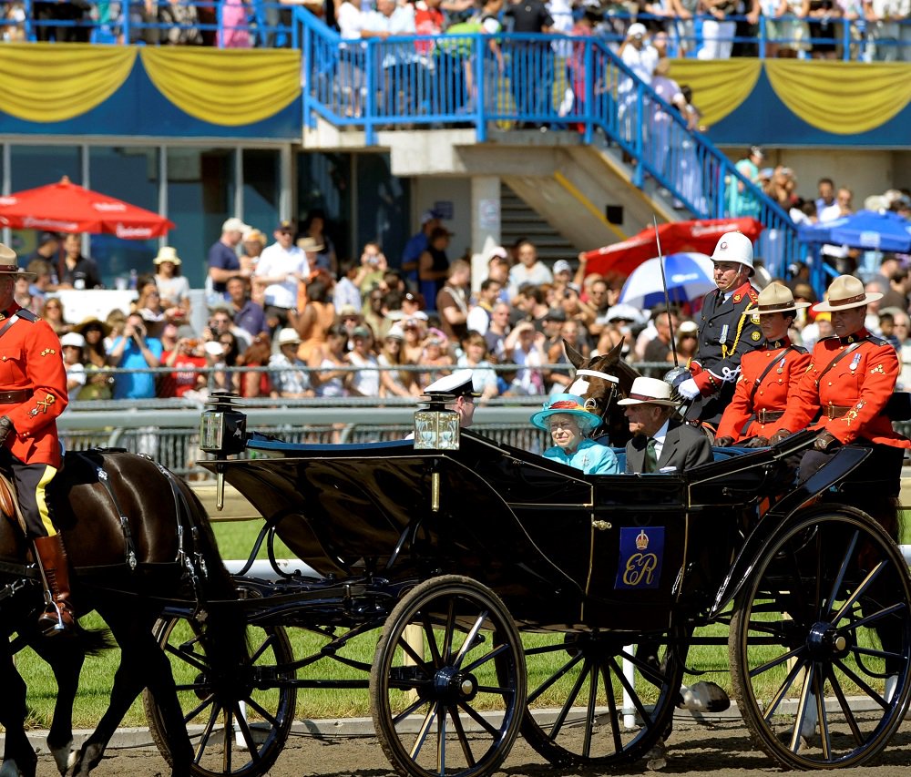 Queen Elizabeth II with her husband Prince Philip on a royal carriage Woodbine Racetrack on her visit for Queens Plate