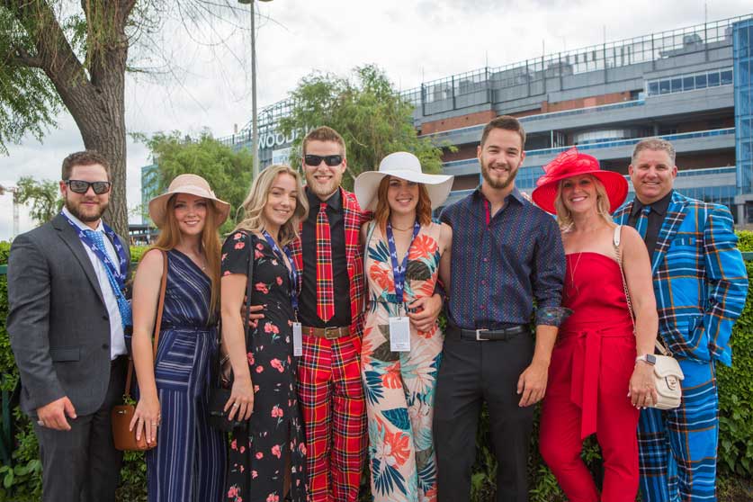 Style icons in a group photo at the Queen's Plate