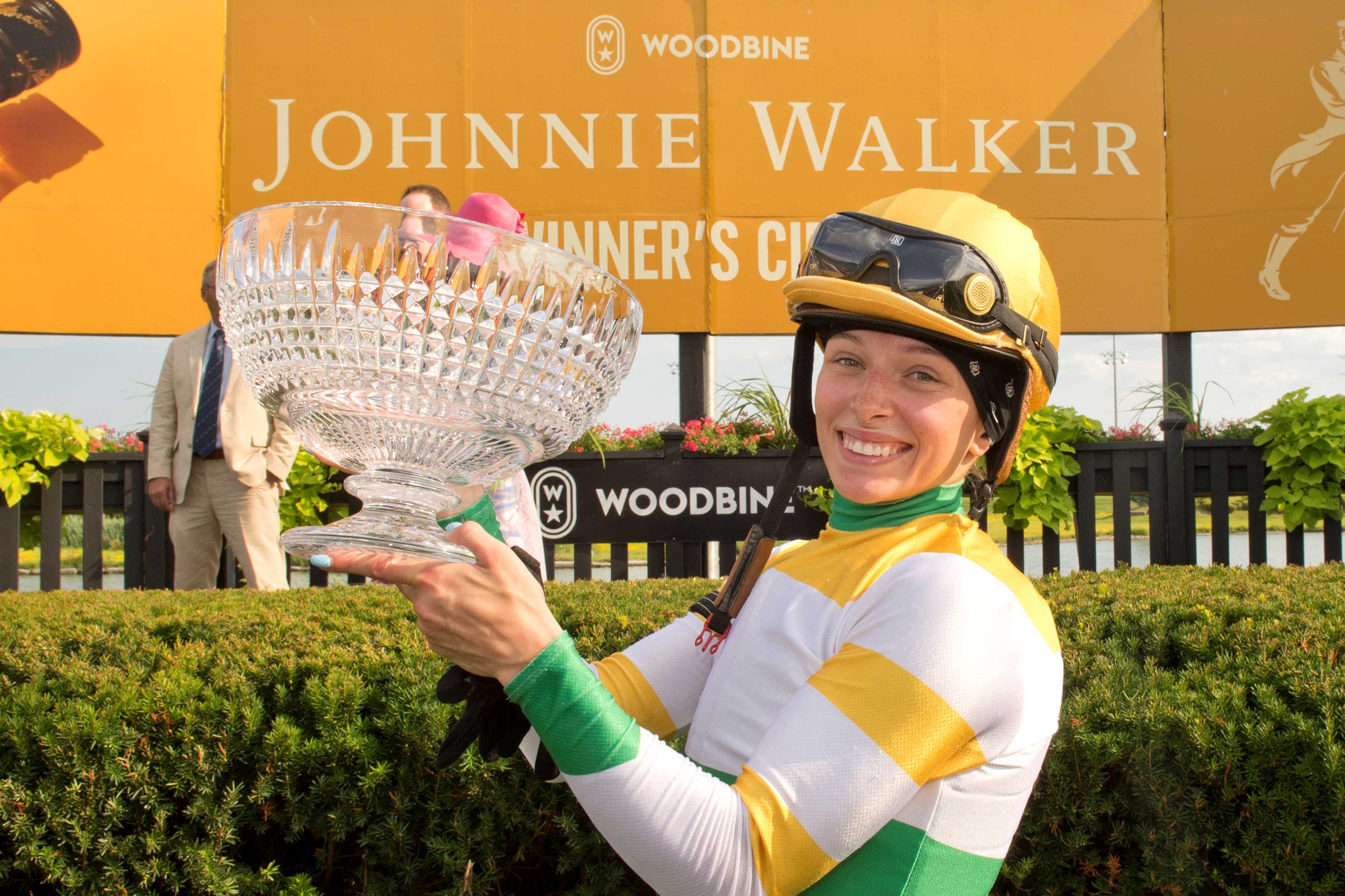 Sofia Vives in Chiefswood Stables silks in the winner's circle for the 2024 Woodbine Oaks (Michael Burns Photo)