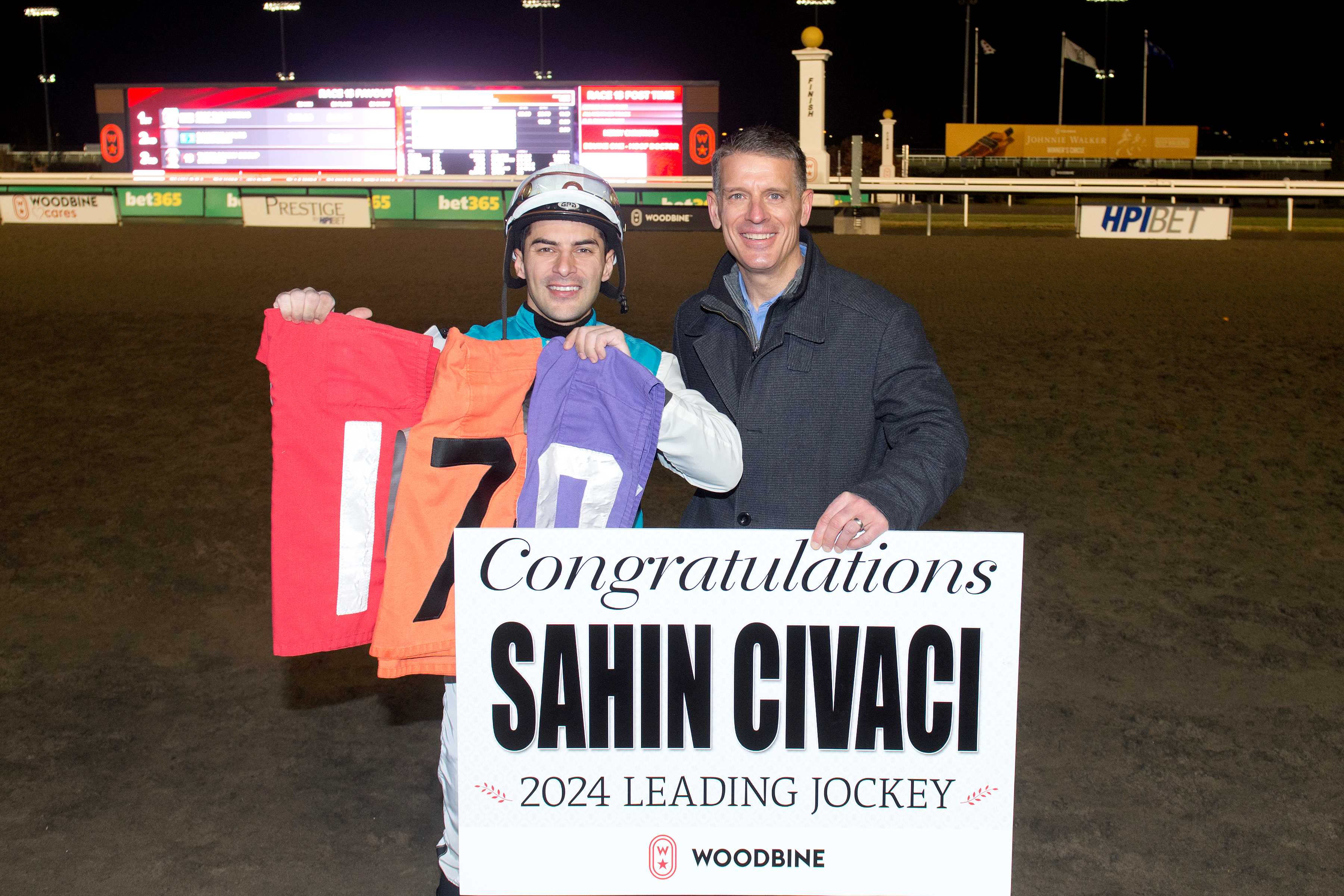 2024 leading jockey Sahin Civaci and Woodbine CEO Michael Copeland (Michael Burns Photo)