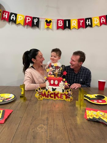 Gary Boulanger, Jennifer Petricca and their son Cristian celebrating a birthday. (Supplied).