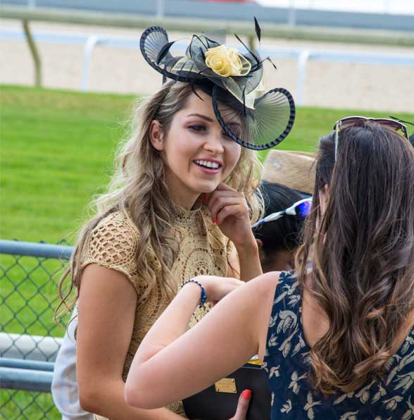 Guests chatting at the King's Plate at Woodbine Racetrack
