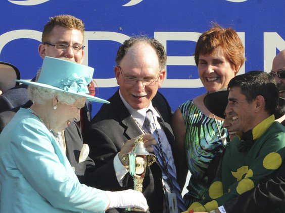 Her Majesty Queen Elizabeth presenting the 2010 Queen's Plate to Big Red Mike, including trainer Nick Gonzalez, wife Martha Gonzales, and jockey Eurico Da Silva. (Michael Burns Photo)