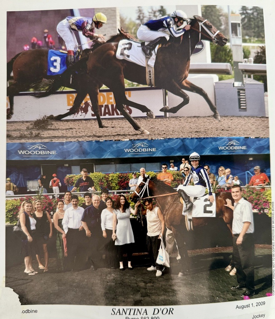 Santina D'Or, the Dam of Lady in Red, in the winner's circle on August 1, 2009 at Woodbine (Michael Burns Photo)