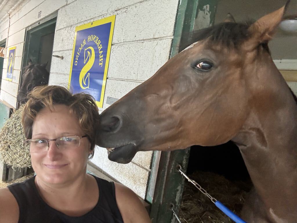 Just Follow Me and groom Sherri Wickett in the Woodbine backstretch 