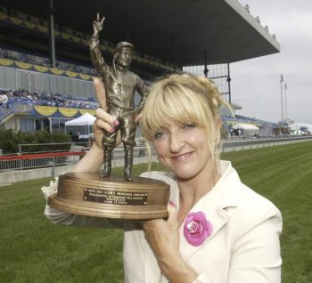 Francine Villeneuve holds her 2004 Avelino Gomez Award (Michael Burns Photo)