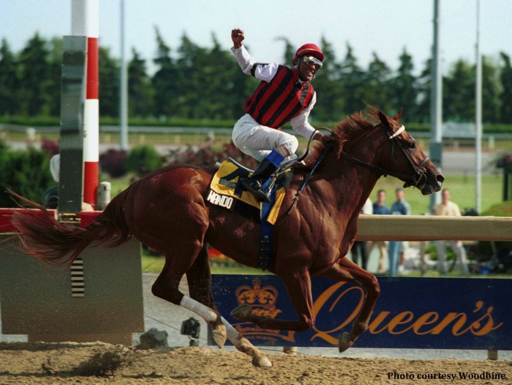 Patrick Husbands winning the 2003 Queen's Plate with Wando (Michael Burns Photo)