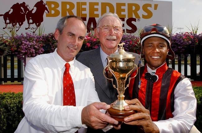 Mike Keogh, Gus Schickedanz, and Patrick Husbands in the winners circle in 2003 at Woodbine (Michael Burns Photo)